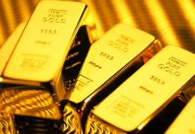 Giá vàng hôm nay 23/4: USD treo cao, vàng dò đáy