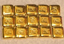 Vàng thế giới tăng sau quyết định từ Fed