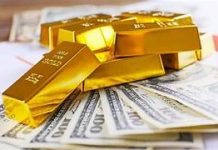 Vàng thế giới quay đầu giảm khi đồng USD ổn định