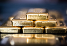 Vàng trượt giá sau phát biểu của một quan chức Fed, SPDR Gold Trust bán ròng
