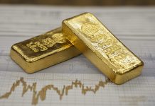 Giá vàng lao dốc khi USD tăng mạnh và lo ngại chiến tranh kéo dài